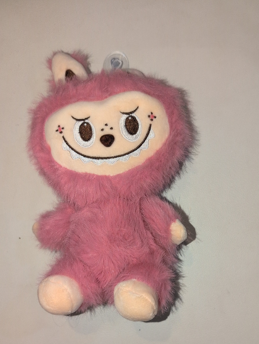 Pink Fuzzy Monster Plush With Suction Cup For Hanging